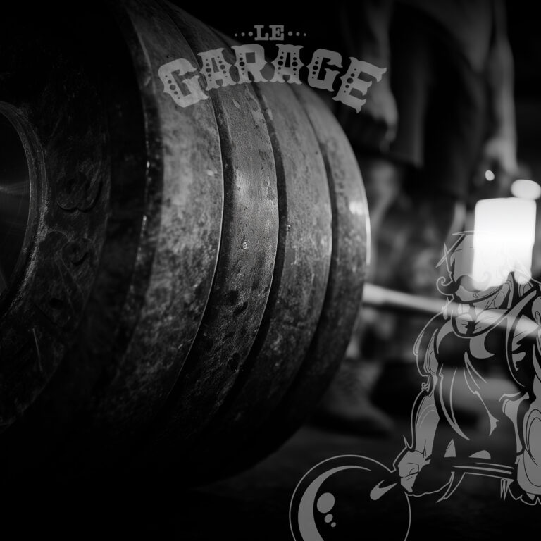 Disques de fonte et logo du Garage de Chaudes-Aigues